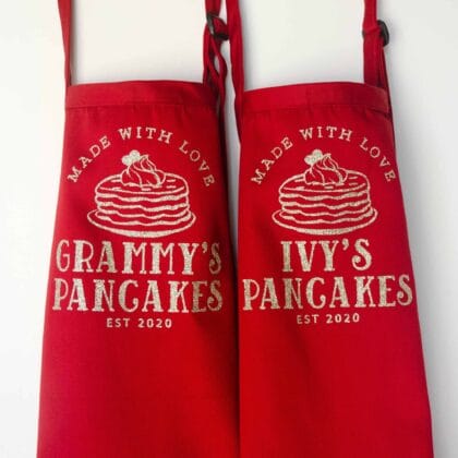 a set of matching Personalized Pancake Aprons in red