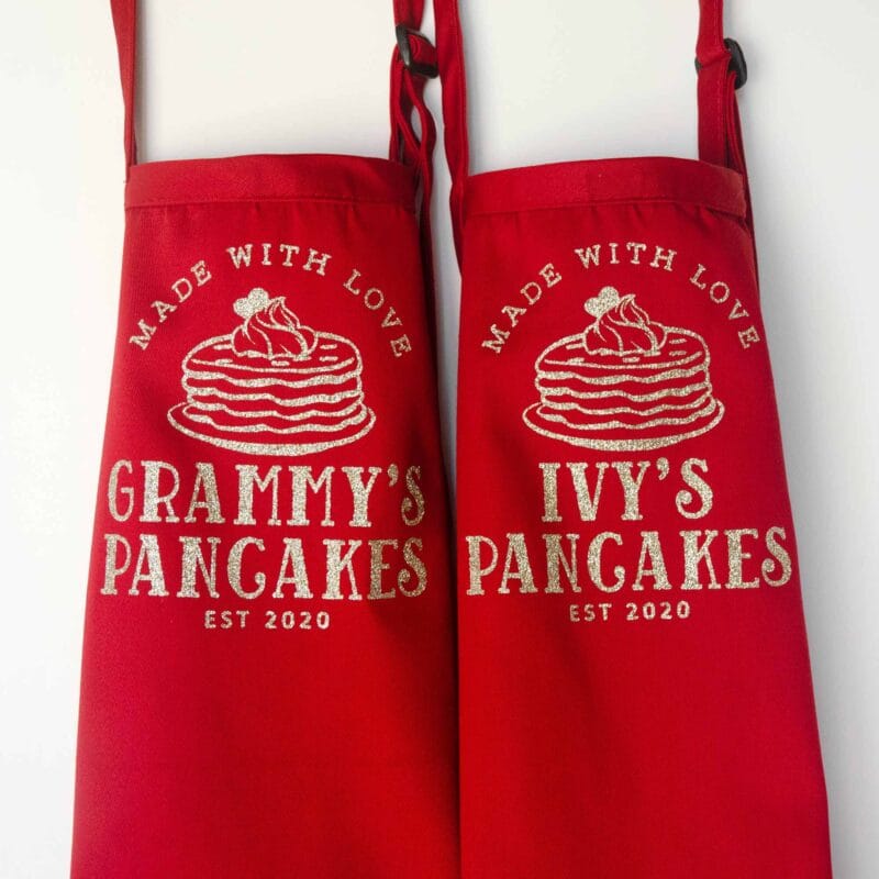 a set of matching Personalized Pancake Aprons in red