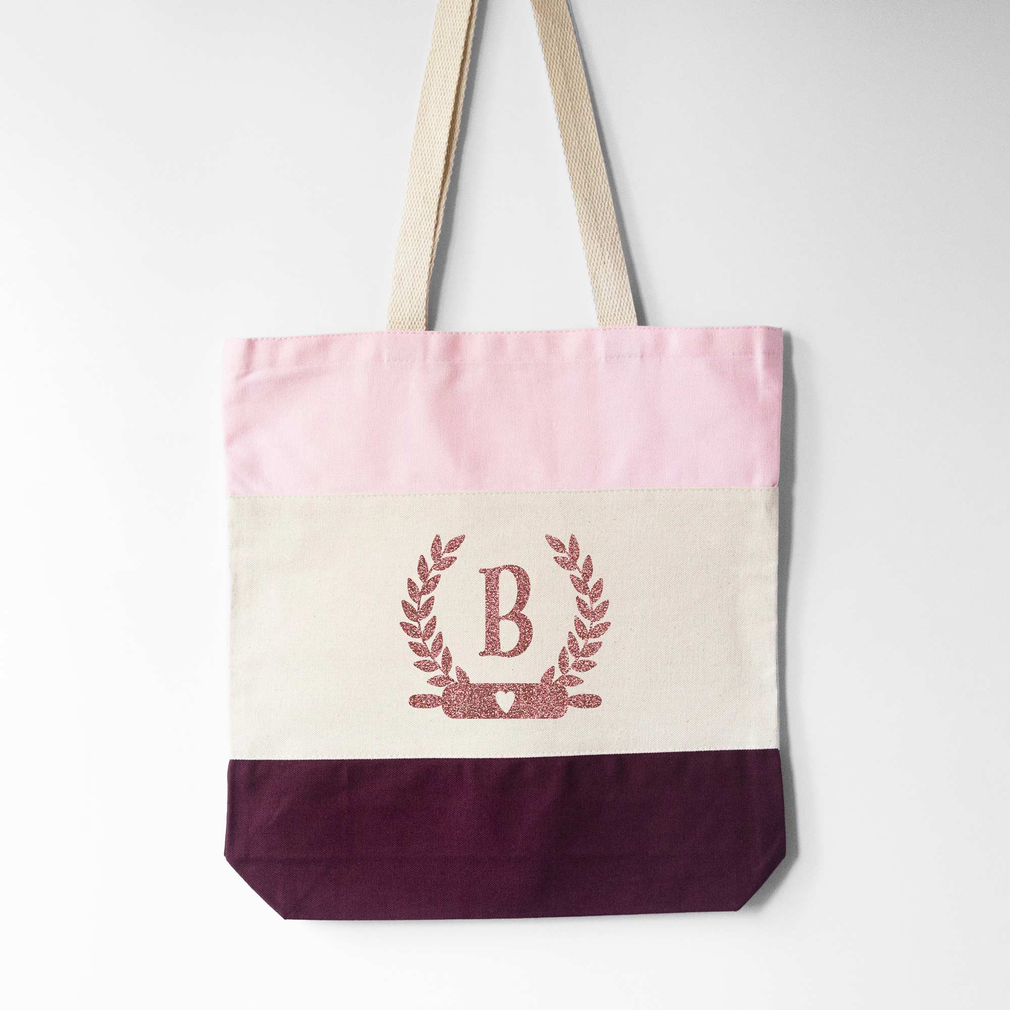 a Monogrammed Baker Tote in pink