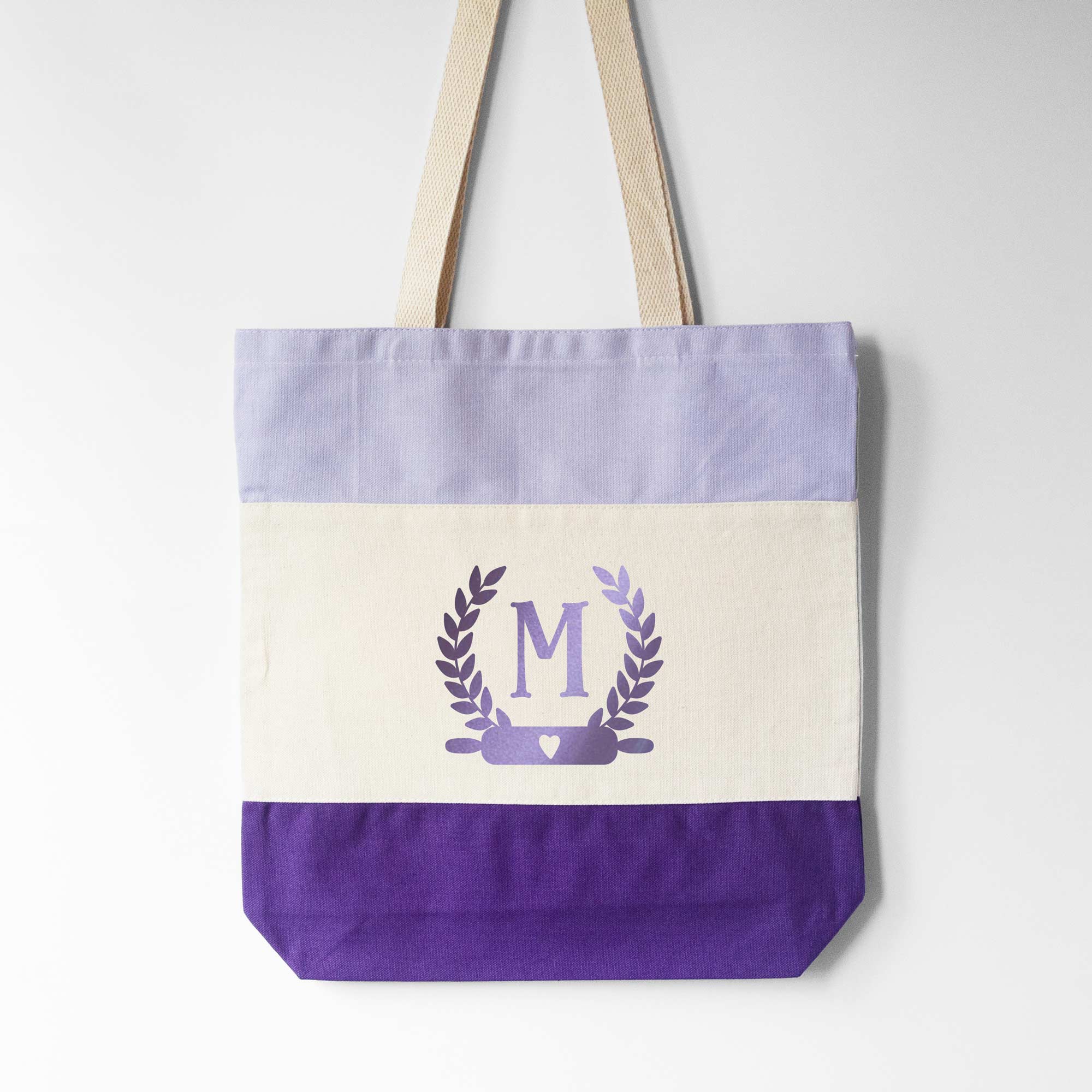 a Monogrammed Baker Tote in purple