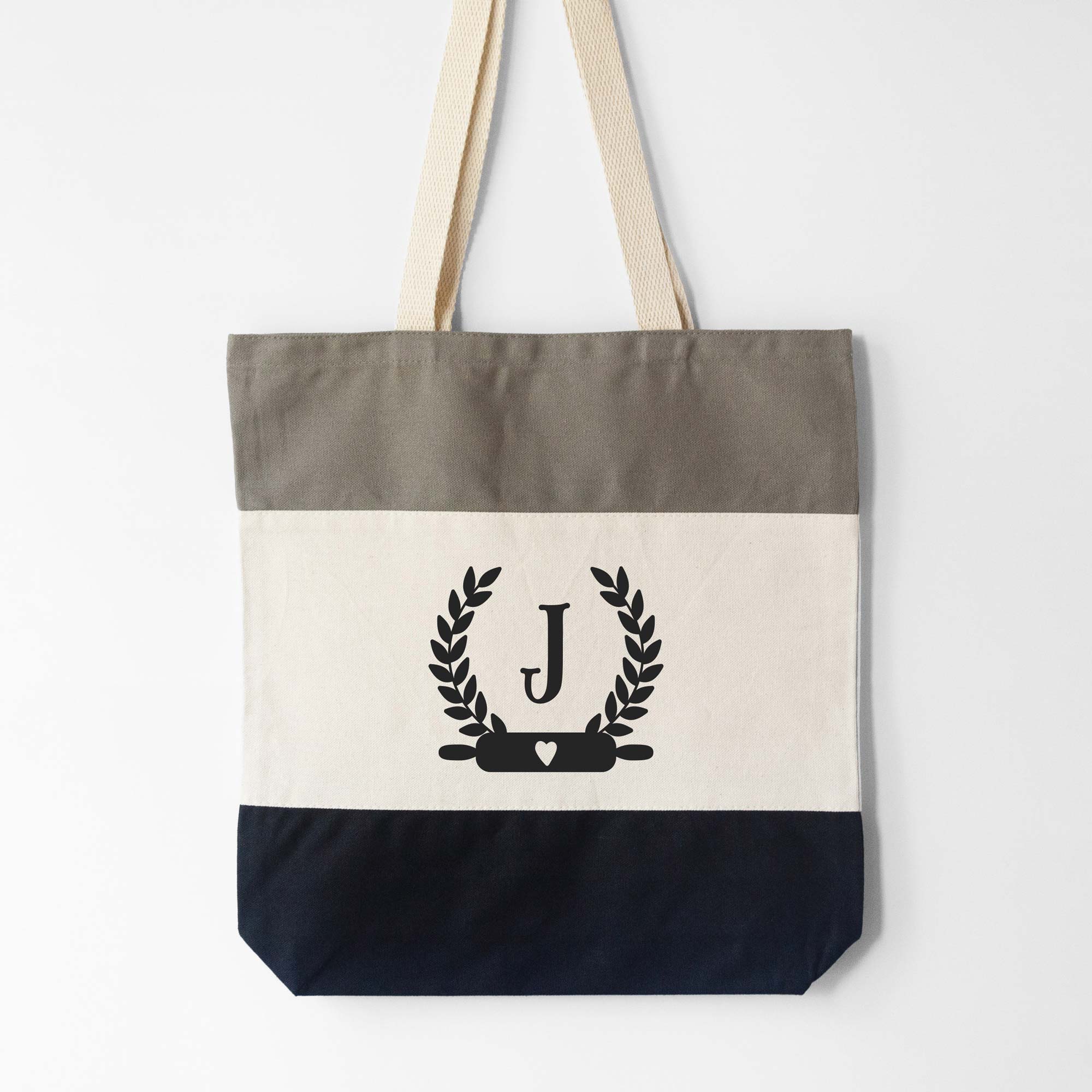 a Monogrammed Baker Tote in black