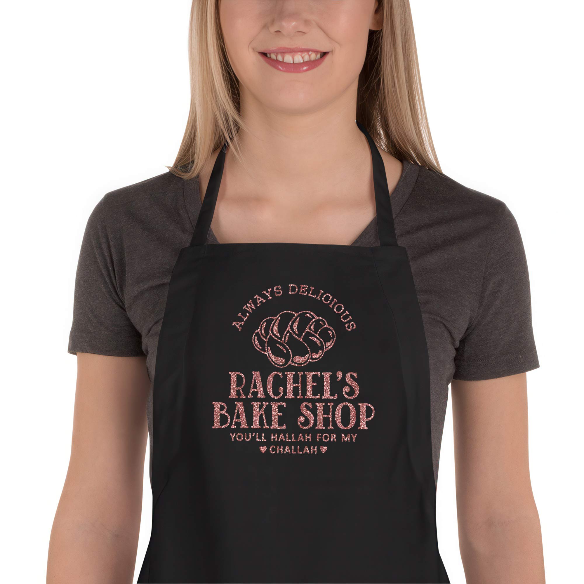 a young woman wearing a Personalized Challah Butcher Apron in black