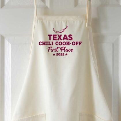 a Personalized Chili Cook-Off Winner Apron in natural