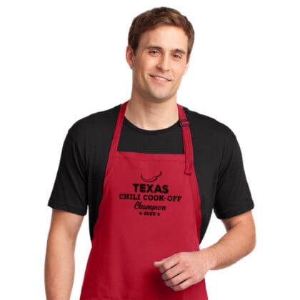 a man wearing a Personalized Chili Cook-Off Winner Apron in red