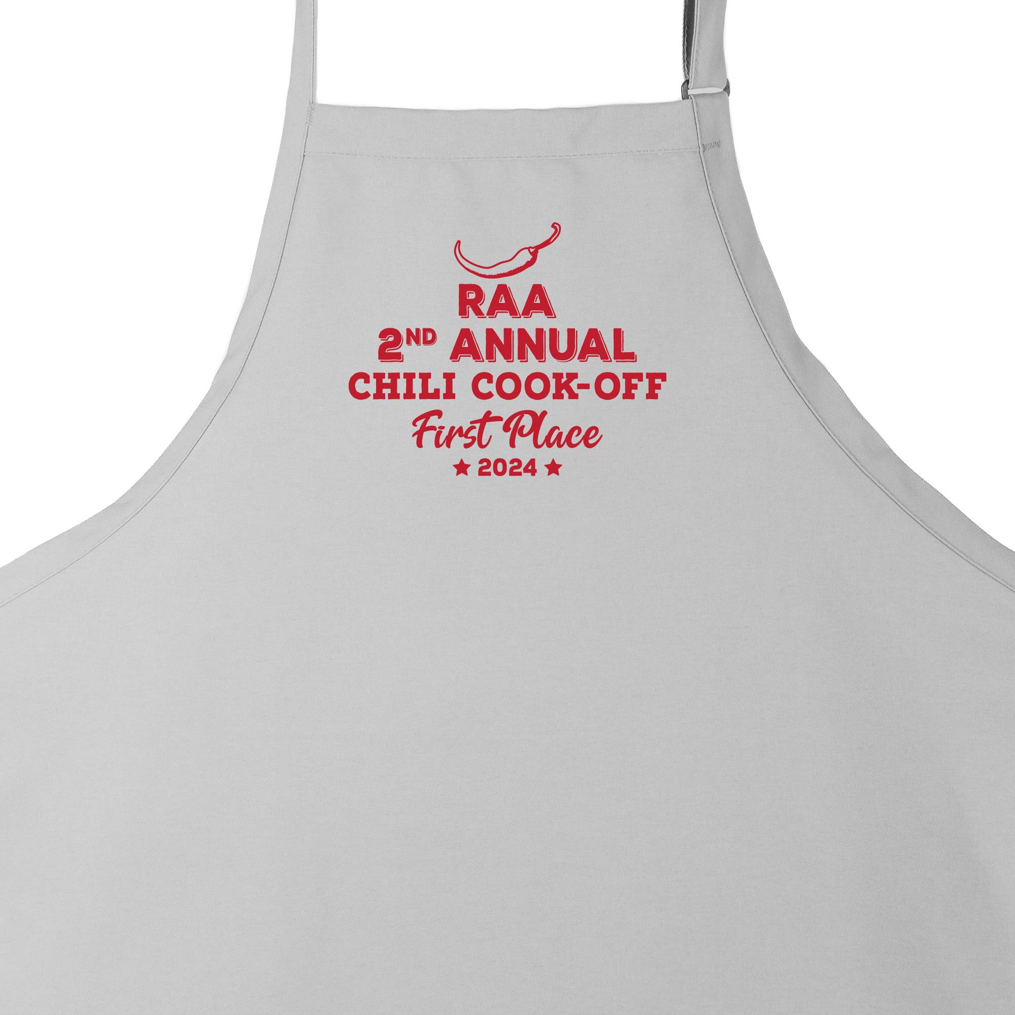 a Custom Premium Chili Cook-Off Winner Apron in silver