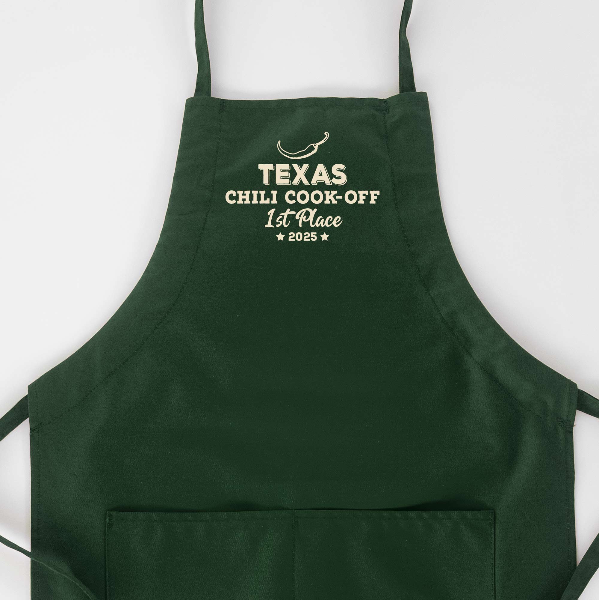 a Personalized Butcher Chili Cook-Off Winner Apron in green