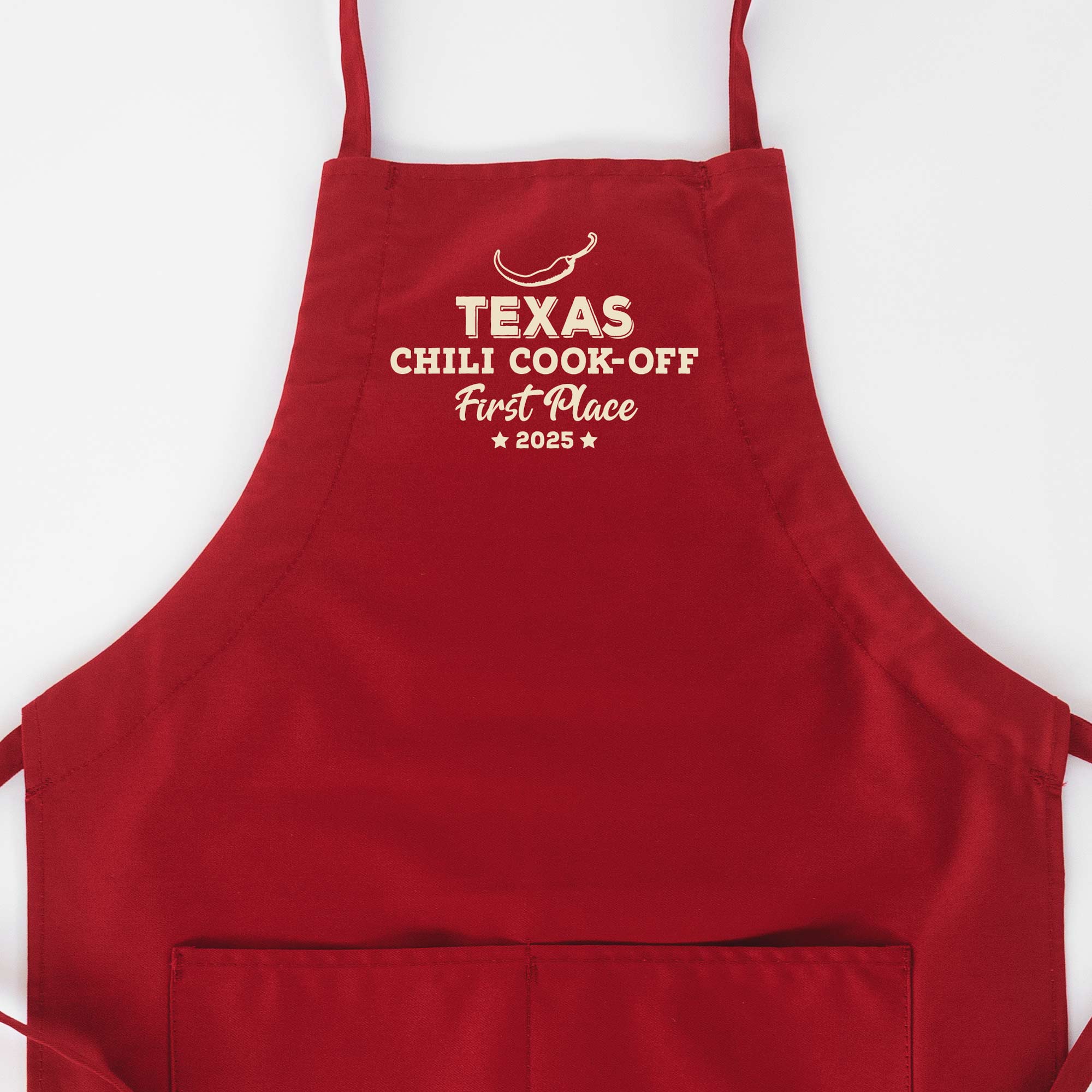 a Personalized Butcher Chili Cook-Off Winner Apron in red