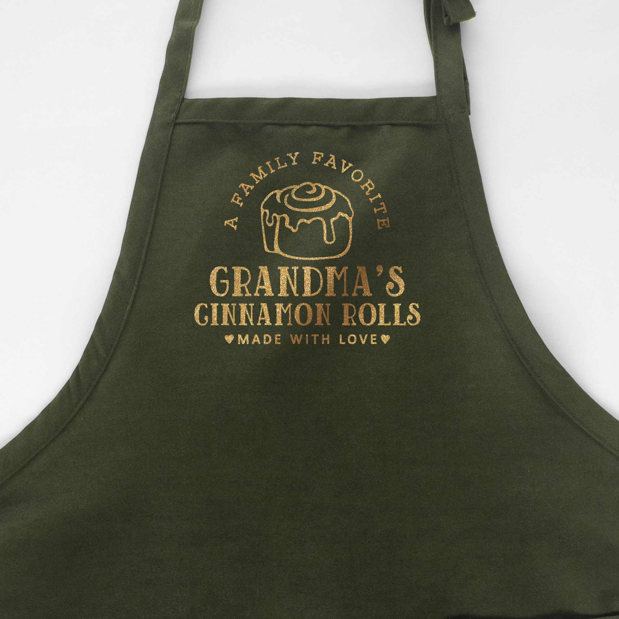 a personalized cinnamon roll apron in green