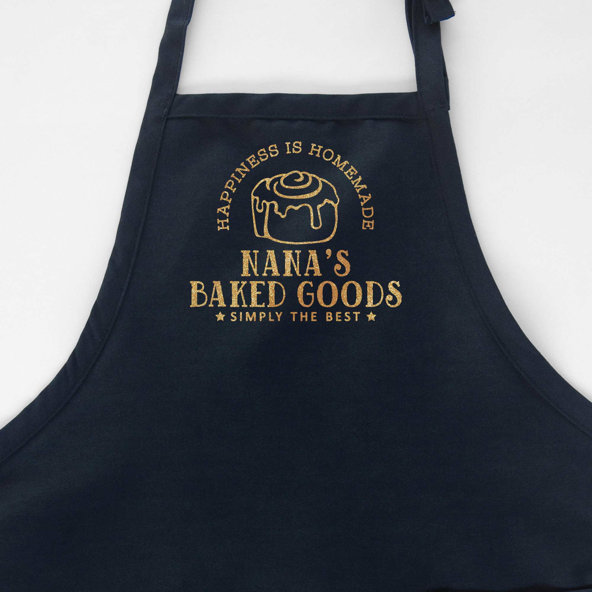 a personalized cinnamon roll apron in navy