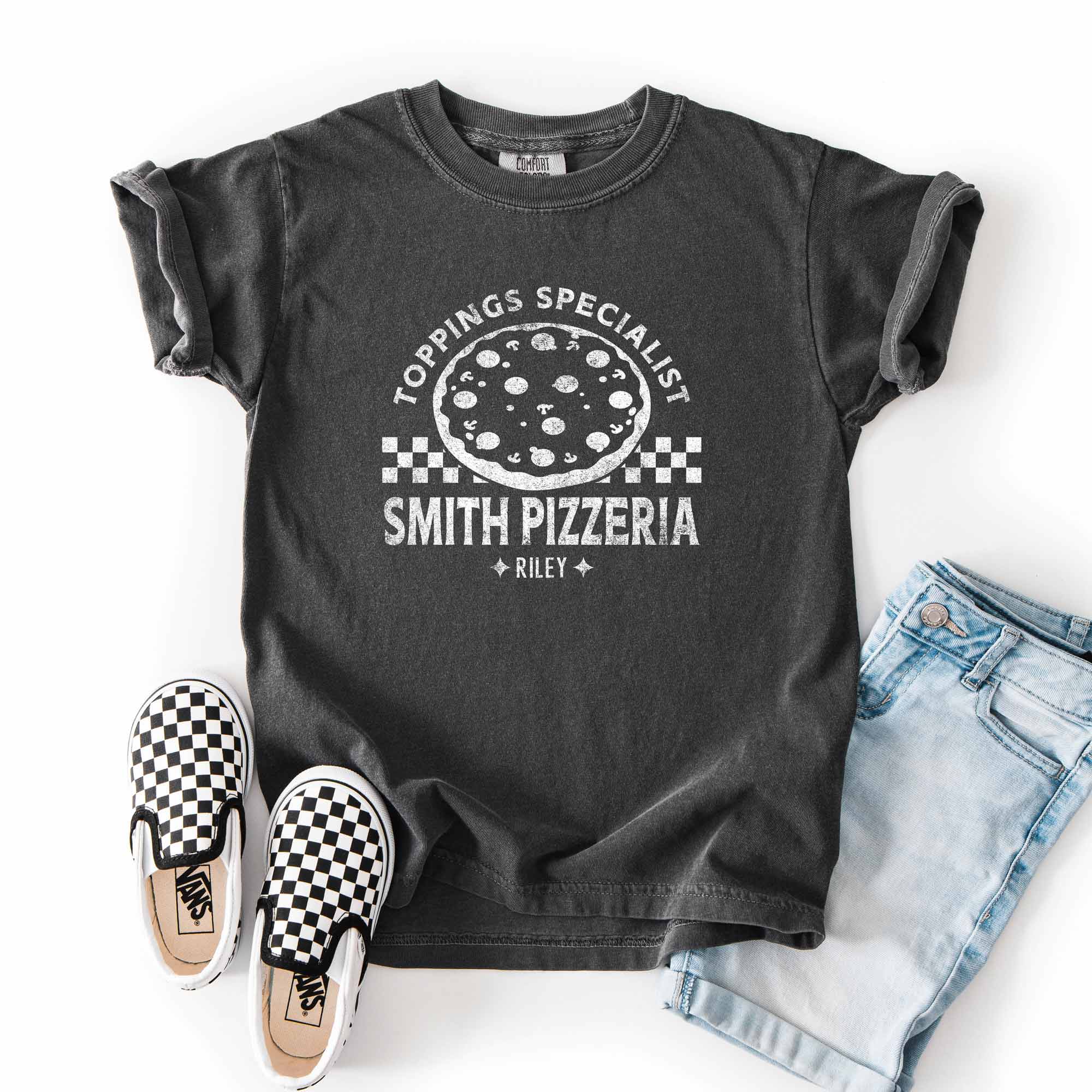 a Kids Checkered Pizza T-Shirt in pepper