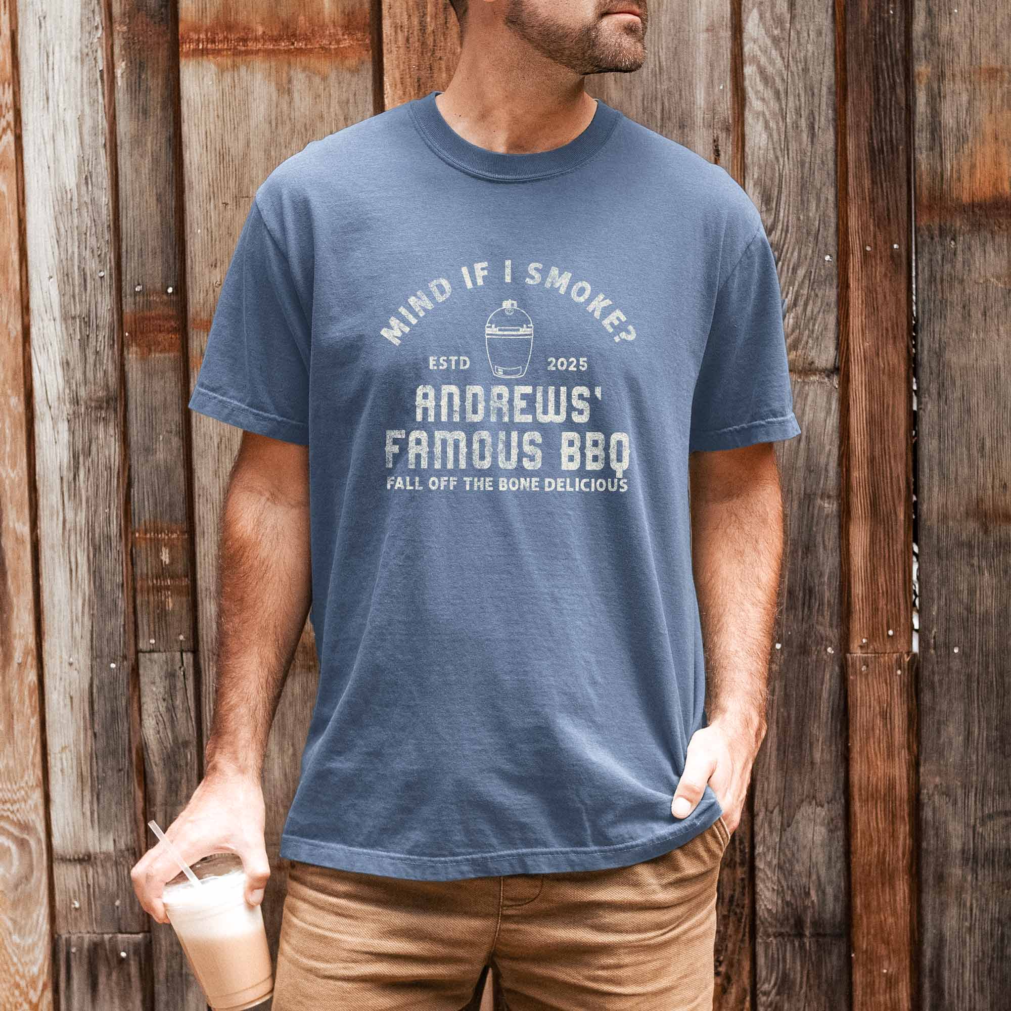 a man wearing a Personalized Meat Smoker Shirt in blue jean