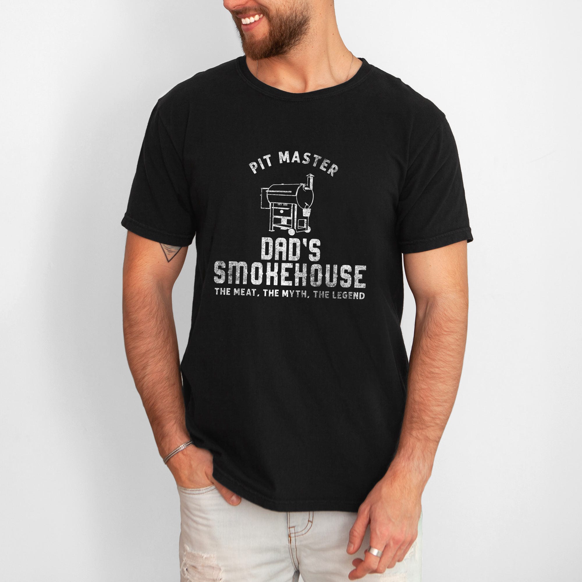 a man wearing a Personalized Smoker Grill T-Shirt in black