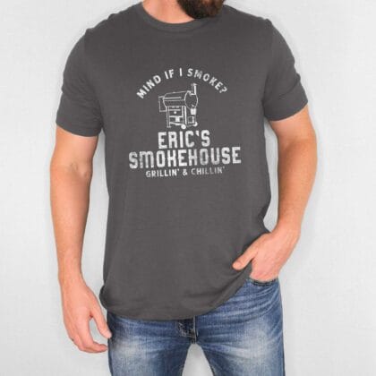 a man wearing a Personalized Smoker Grill Shirt in asphalt