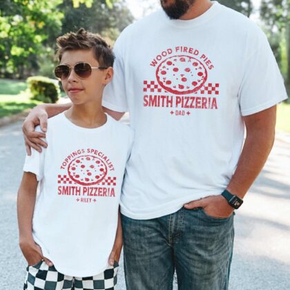 a dad and son wearing matching Checkered Pizza T-Shirts in white