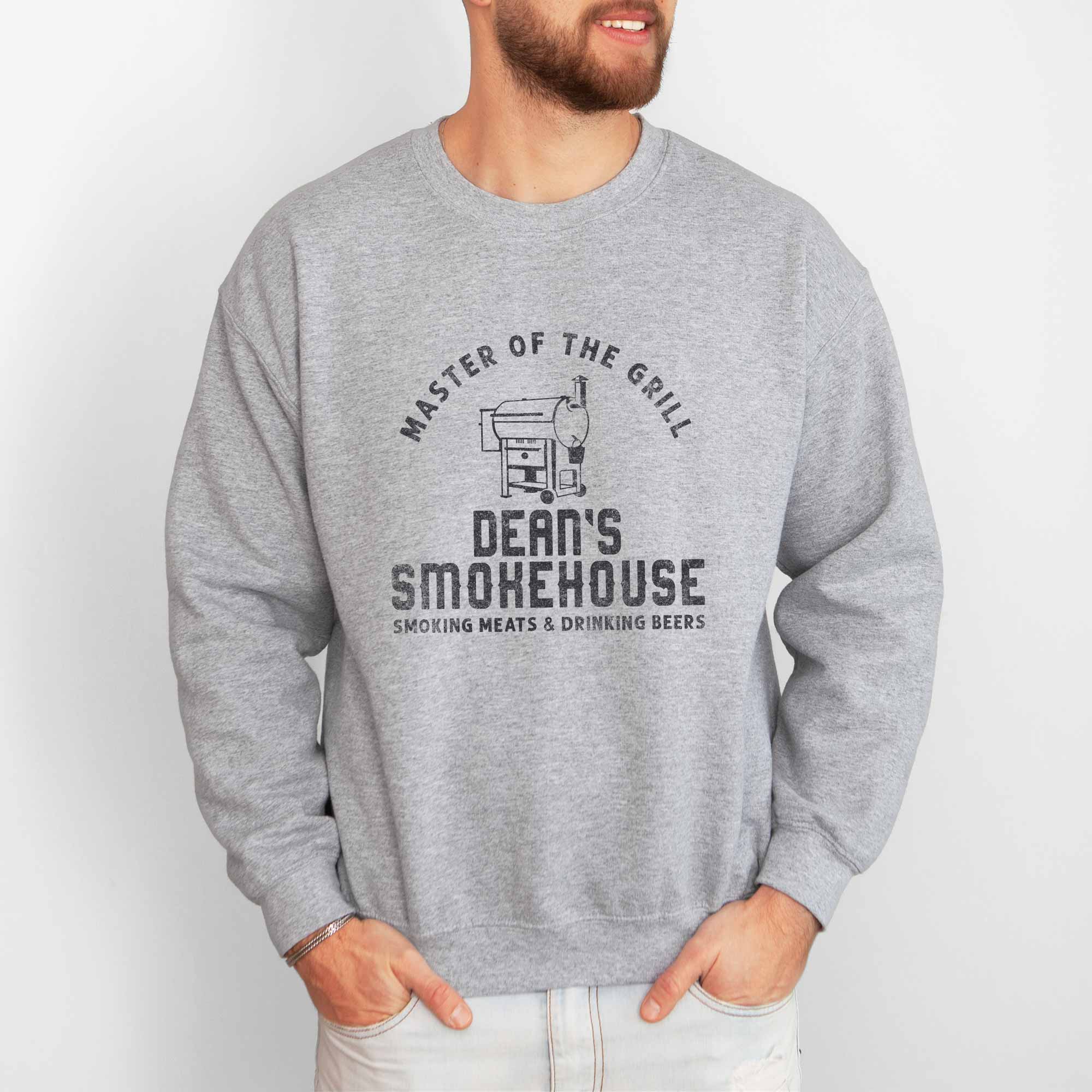 a man wearing a Personalized Smoker Grill Sweatshirt in sport grey
