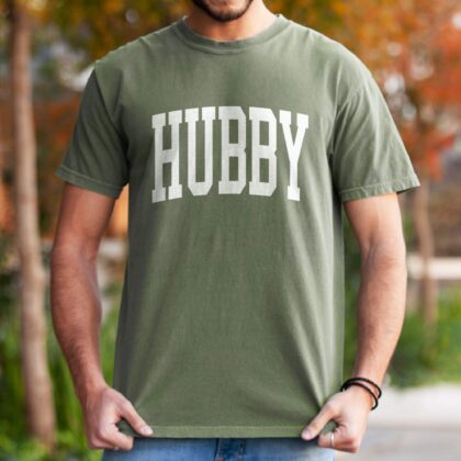 a man wearing a Hubby Garment Dyed T-Shirt in moss