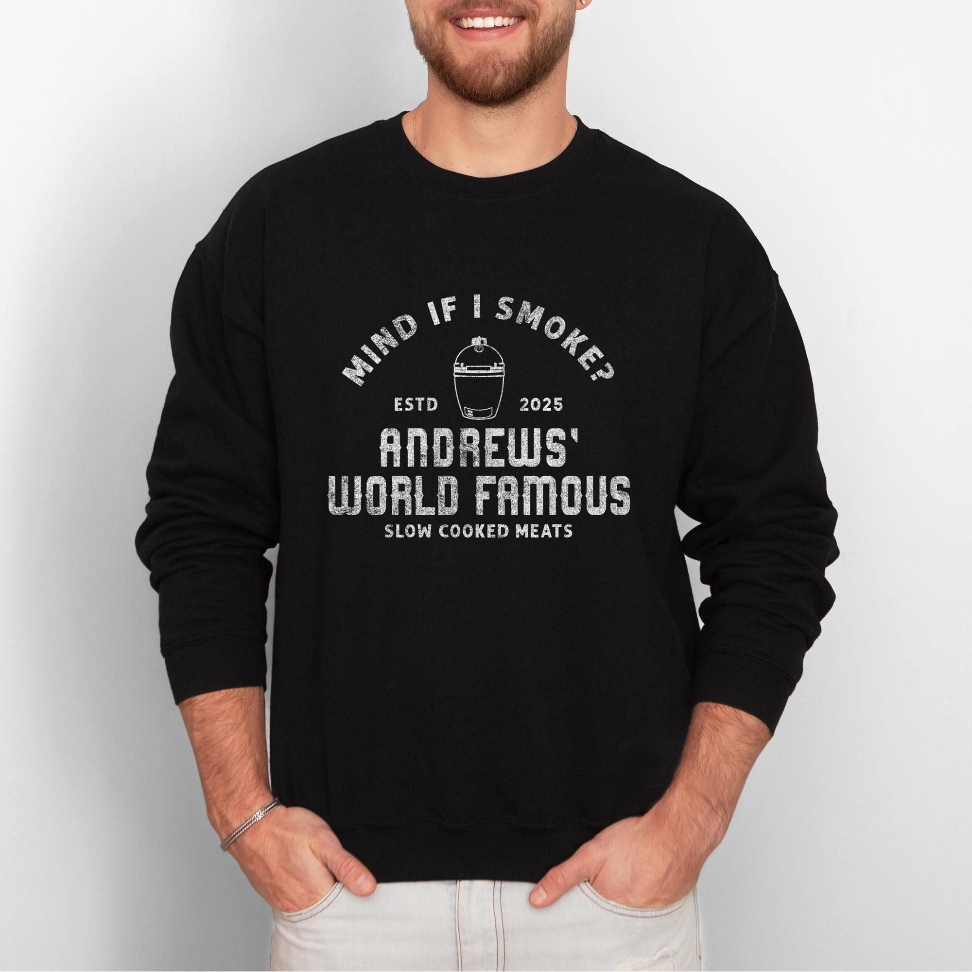 a man wearing a Personalized Meat Smoker Sweatshirt in black