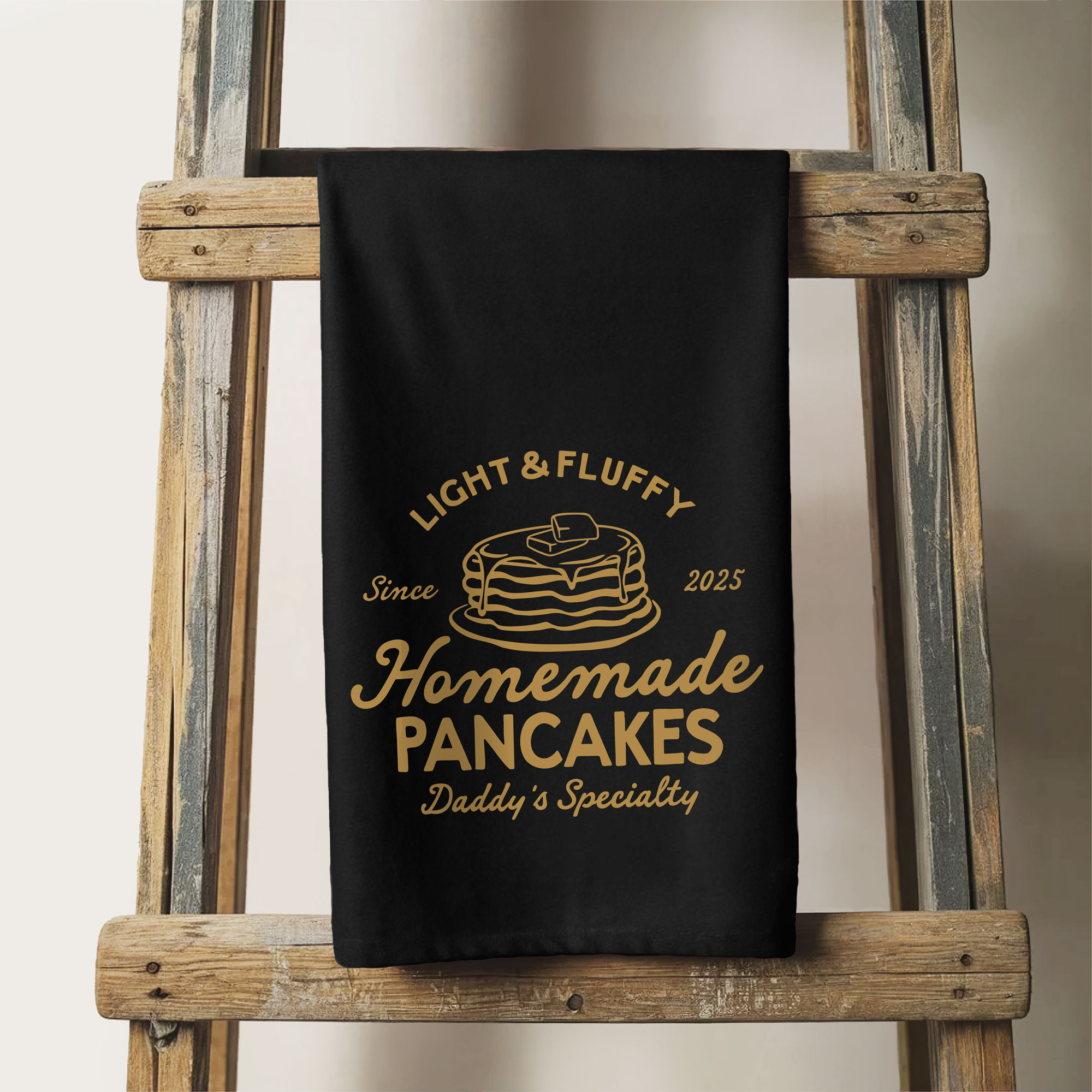 a Pancake Chef Tea Towel in black