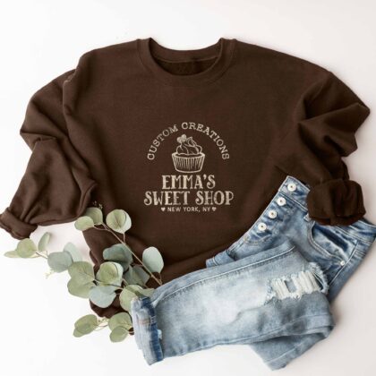 a personalized Cupcake Baking Sweatshirt in dark chocolate