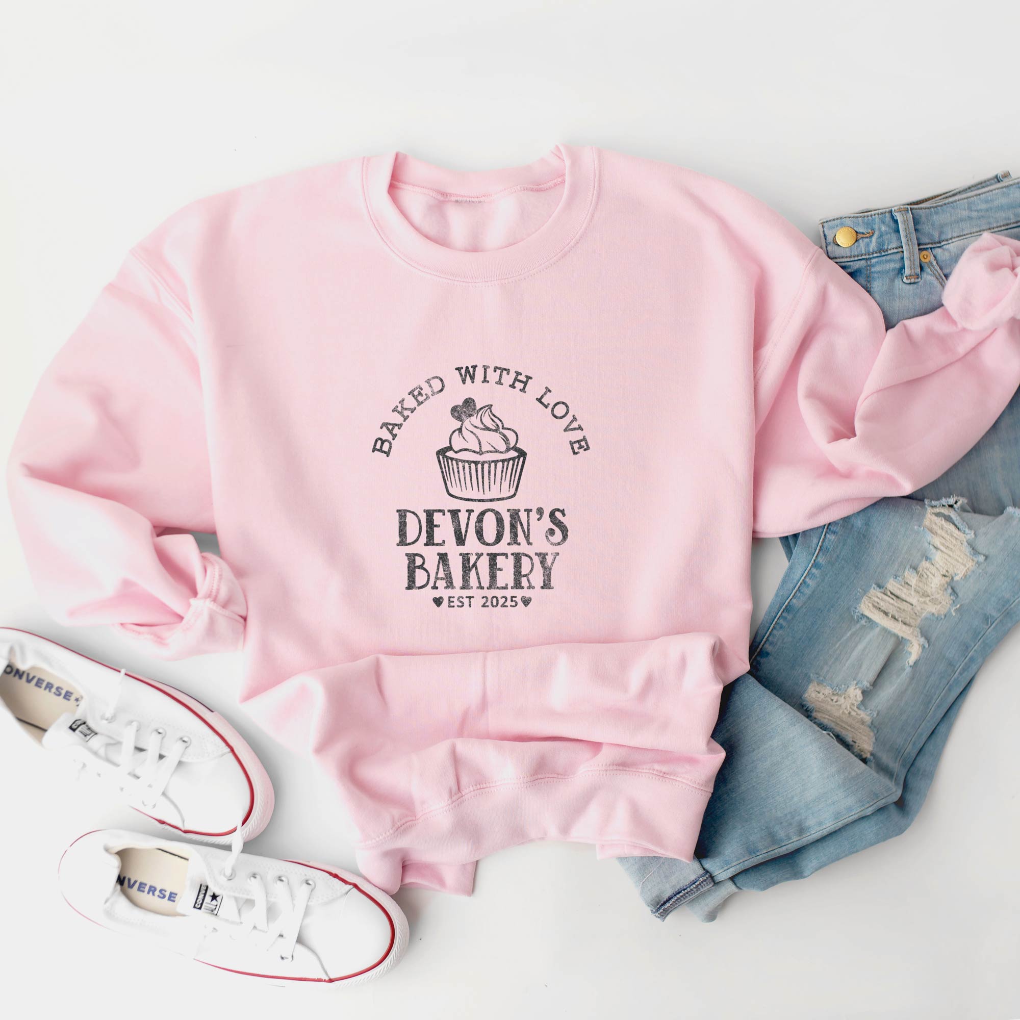a personalized Cupcake Baking Sweatshirt in light pink