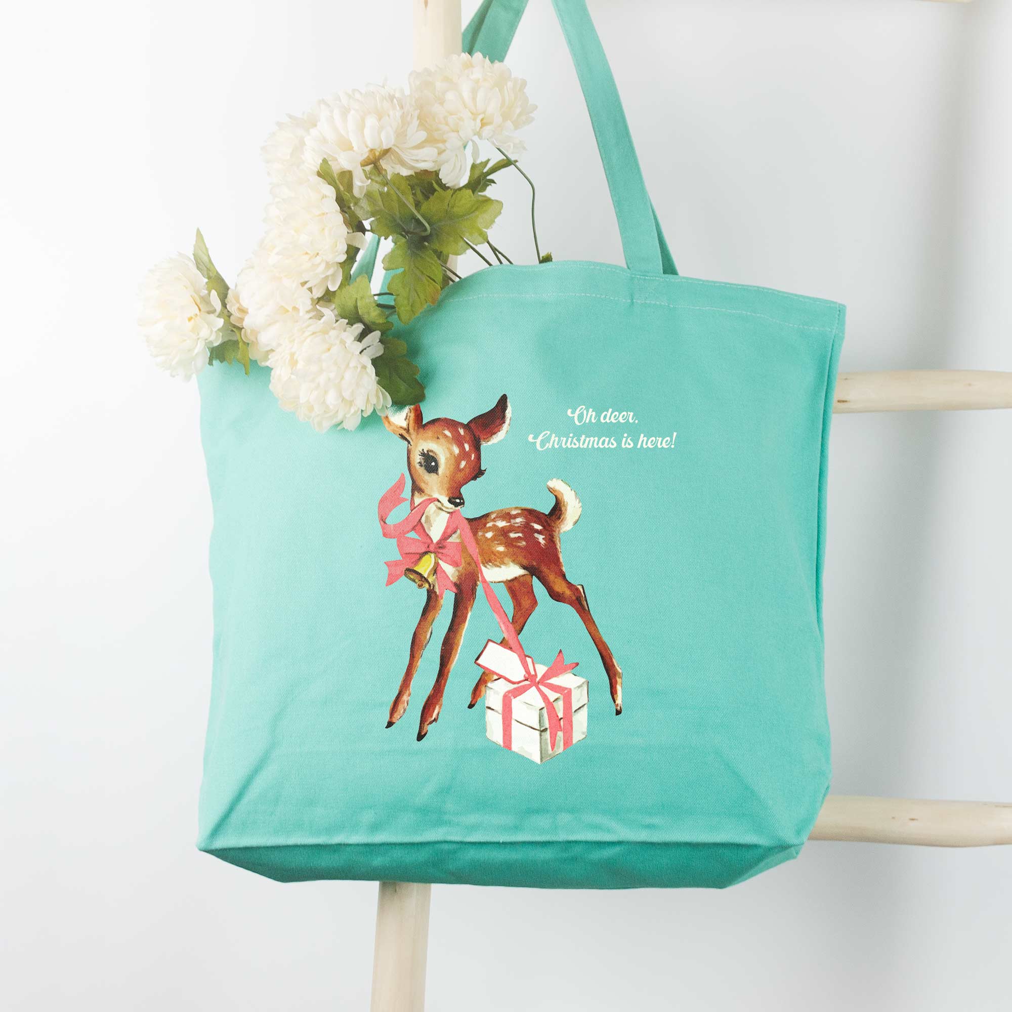 a Retro Deer Tote in Sea Glass