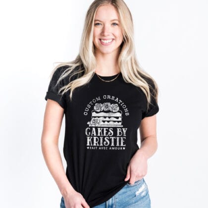 a woman wearing a Personalized Cake Baker Shirt in black with a white print