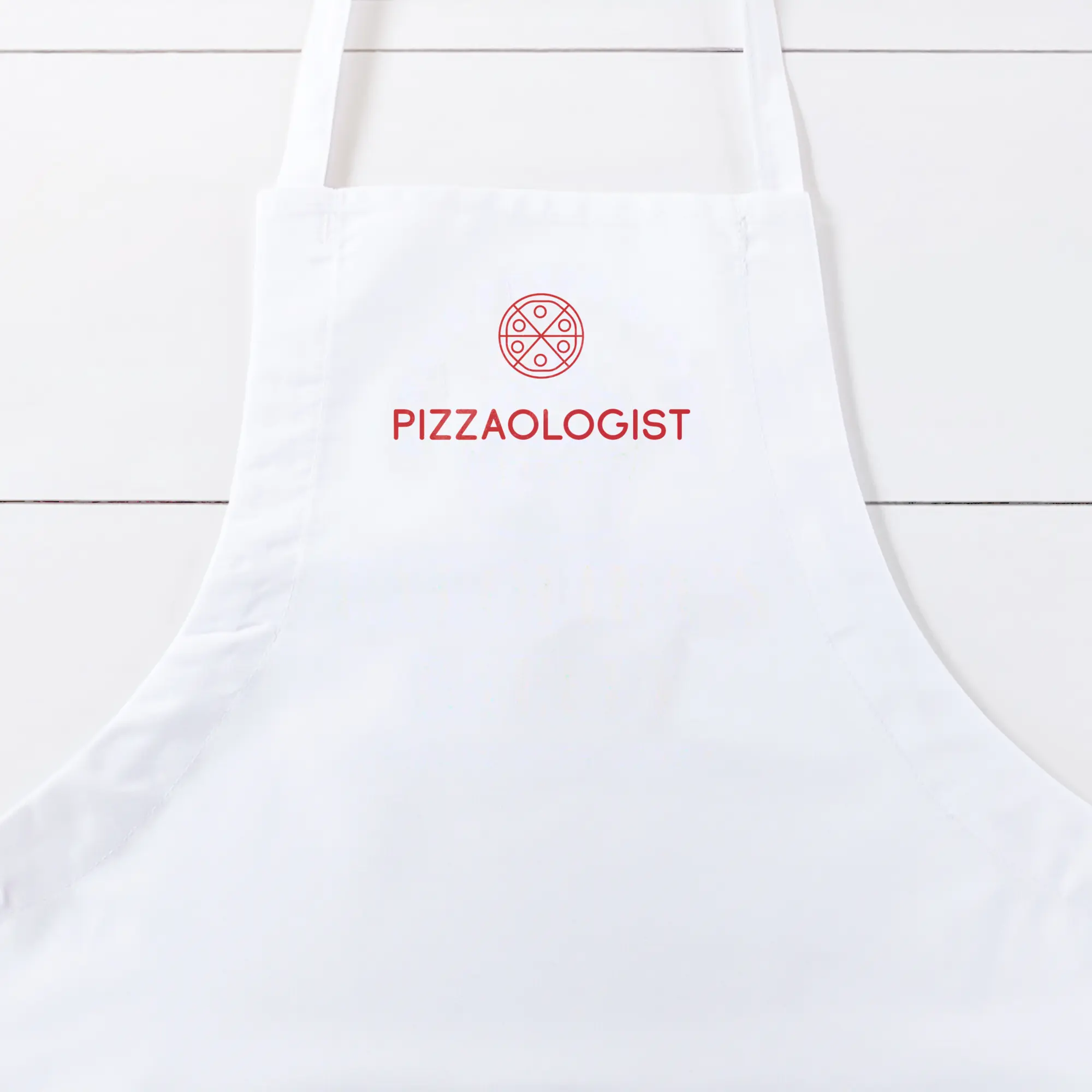 a Pizzaologist Butcher Apron in white