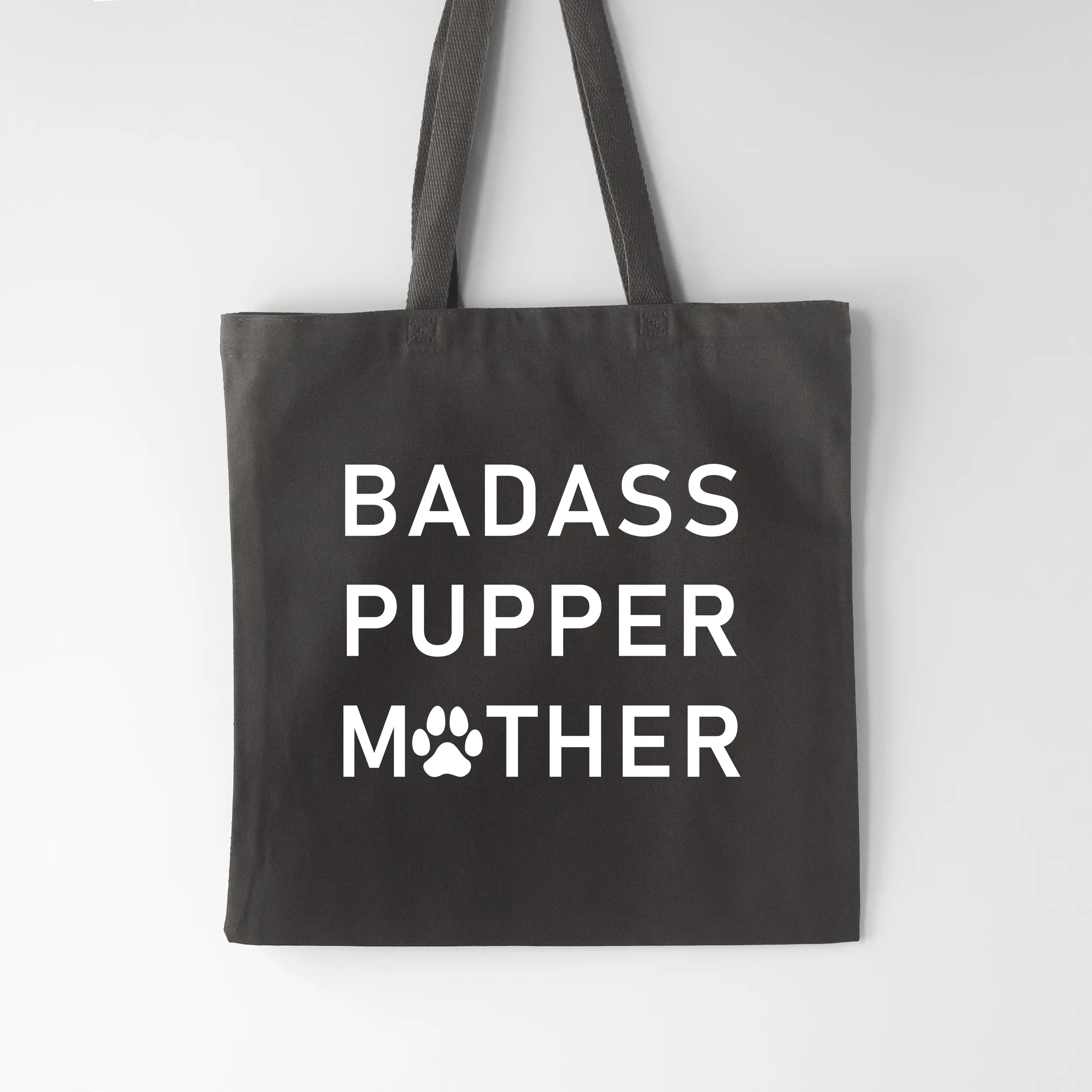 a badass pupper mother tote bag in charcoal
