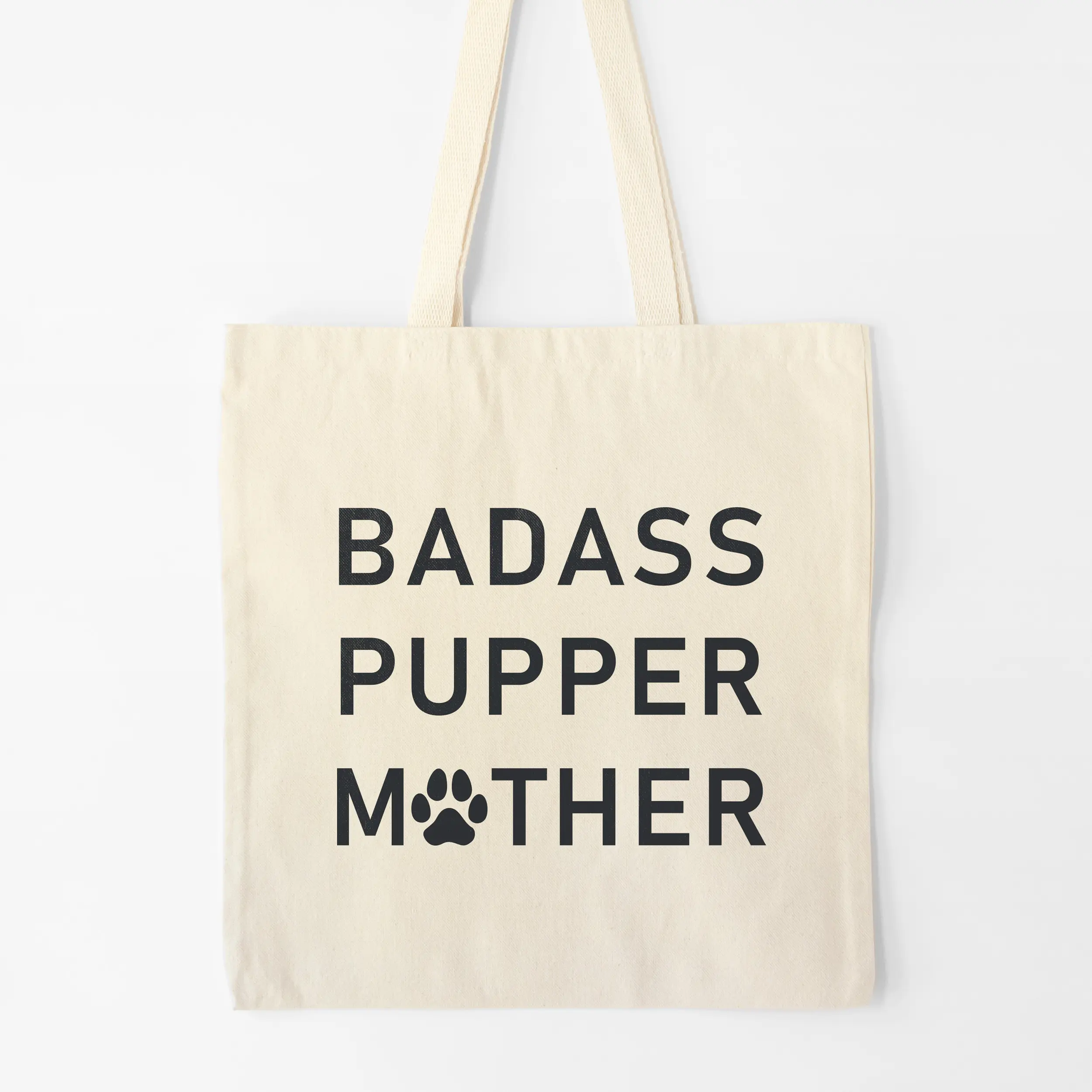 a badass pupper mother tote bag in natural