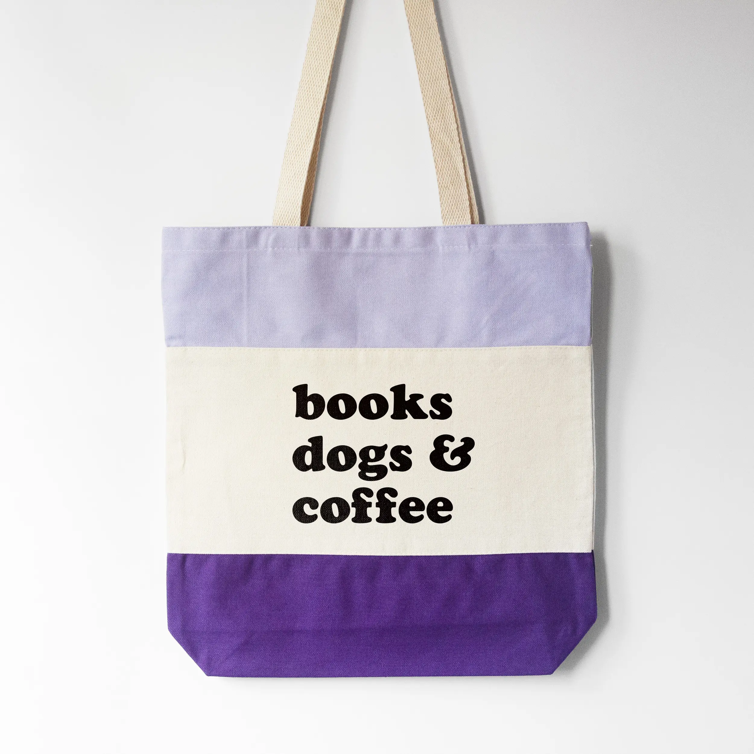 A books dogs and coffee tote in purple