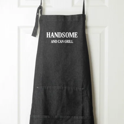 a Handsome And Can Grill Denim Apron in black denim