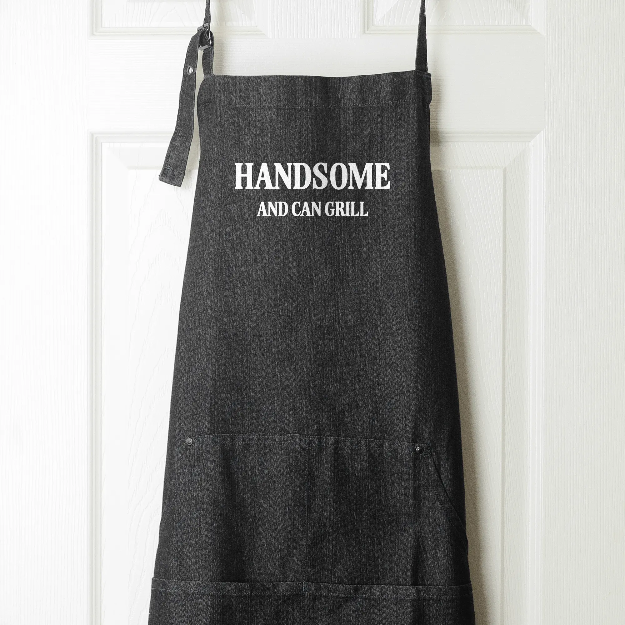a Handsome And Can Grill Denim Apron in black denim