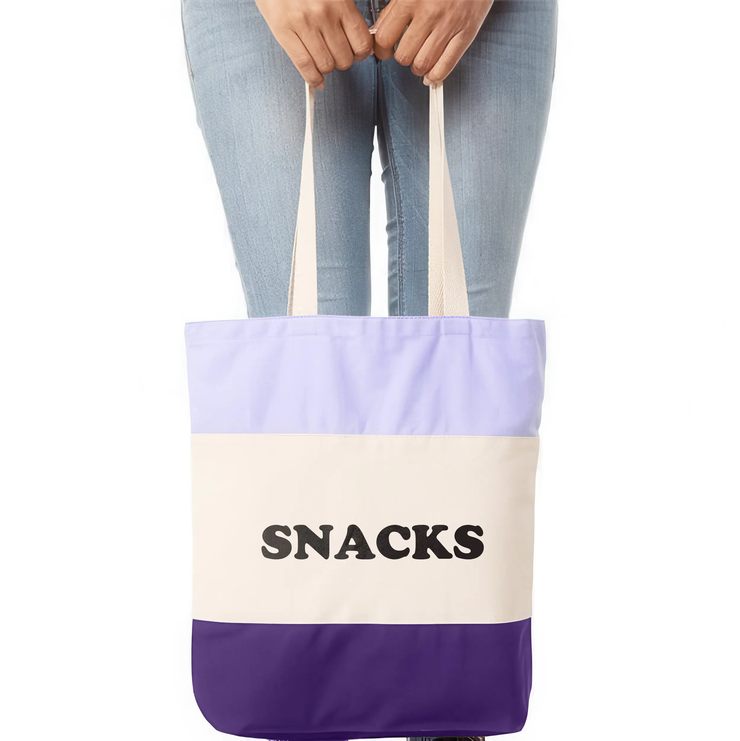a woman holding a snacks tote bag in purple