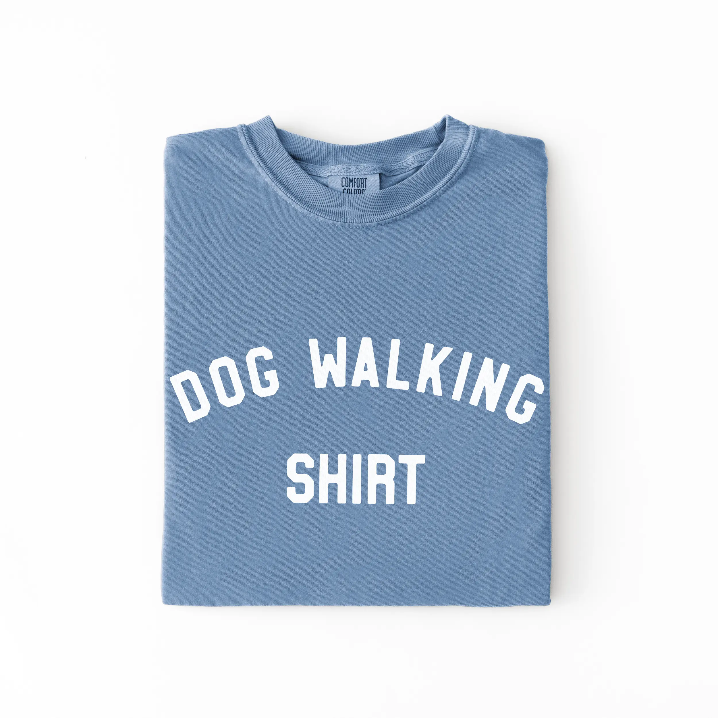 a dog walking shirt in blue jean