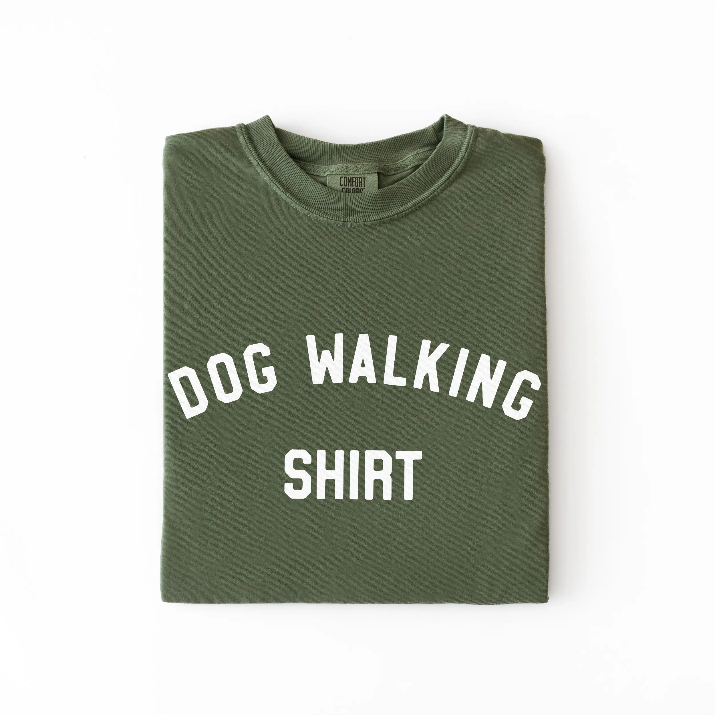 a dog walking shirt in moss