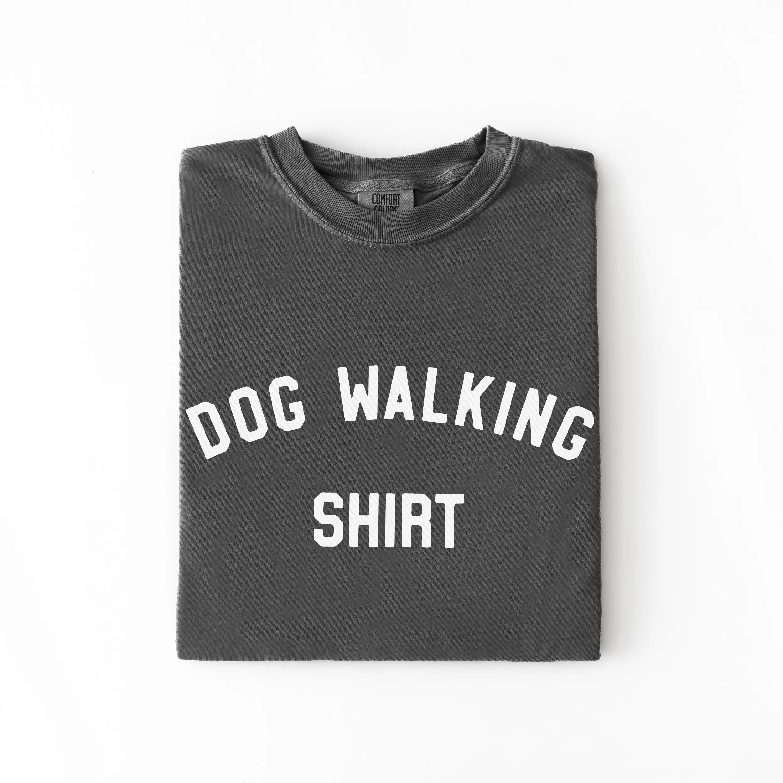 a dog walking shirt in pepper