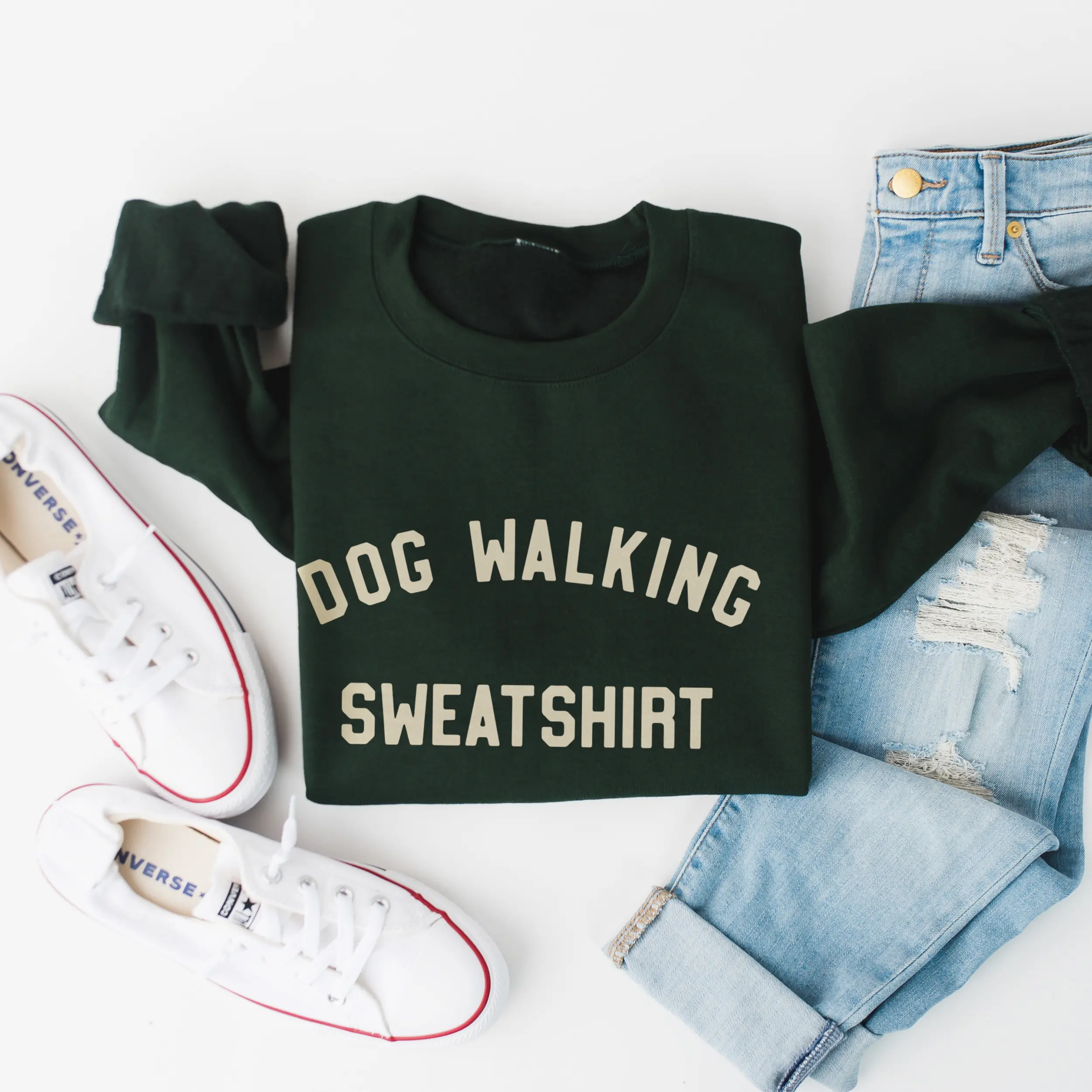 a dog walking sweatshirt in forest