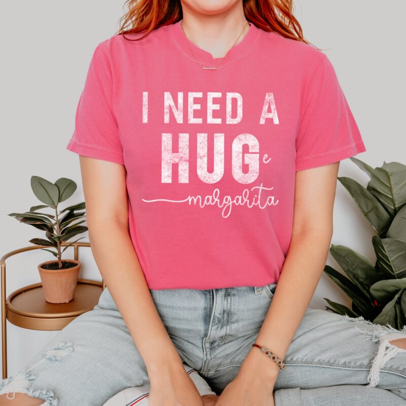 a woman wearing an I Need A Huge Margarita T-Shirt