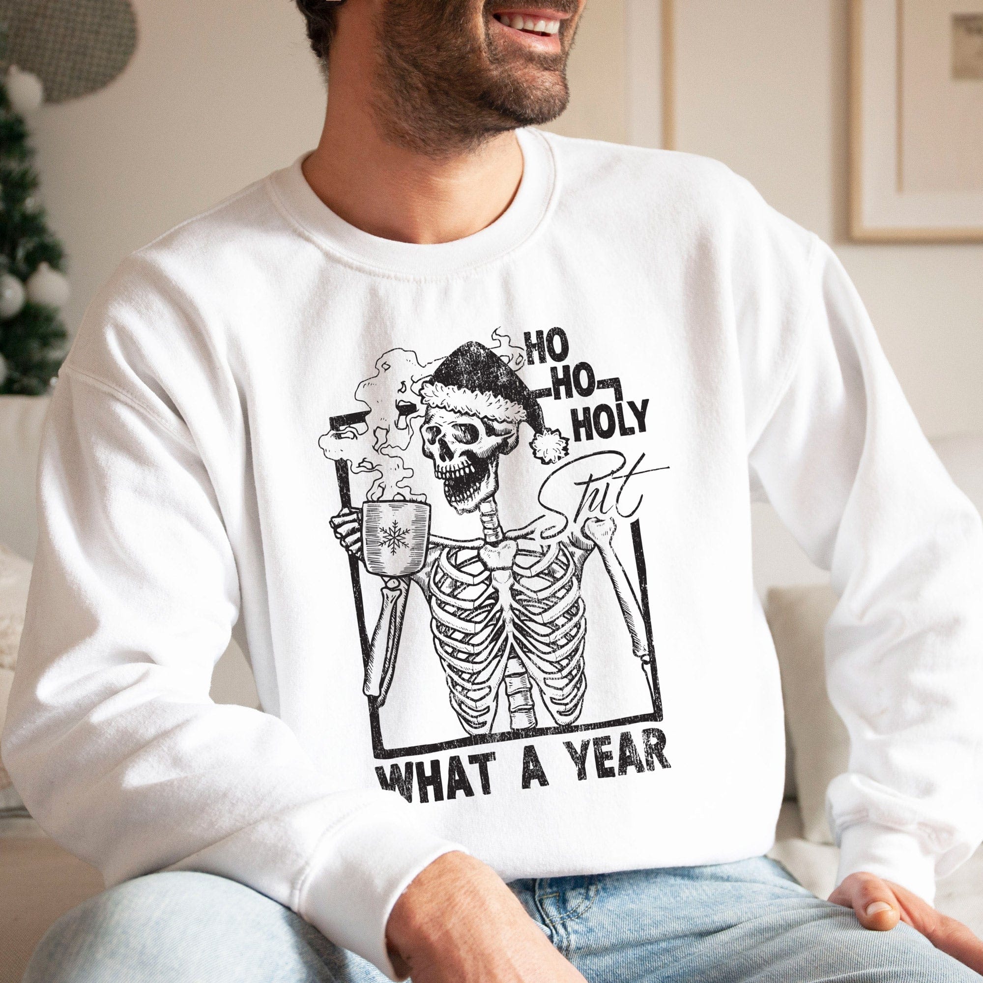 a young man wearing a Ho Ho Holy Shit What A Year Sweatshirt in white